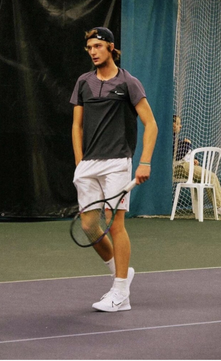 Oleksandr Ponomar competing on court at an ITF tournament